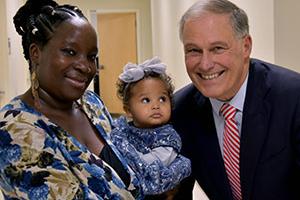 Governor Inslee with Masitsa and infant daughter